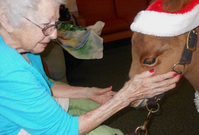 EHL Resident with our Pet Therapist, Buddy